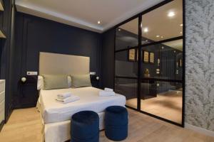 Posteľ alebo postele v izbe v ubytovaní Letmalaga Granada Premium