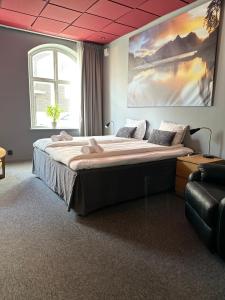 Postel nebo postele na pokoji v ubytování City HotelApartment