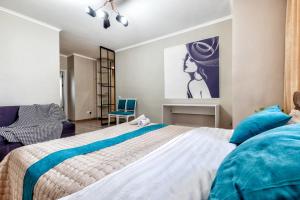 Postel nebo postele na pokoji v ubytování ЖК Арман Кала