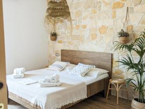 Postel nebo postele na pokoji v ubytování Arya Room Villasimius