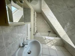 Koupelna v ubytování Hostel DünenMeer + 27 fotografií