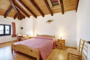 Postel nebo postele na pokoji v ubytování Casa Predaia