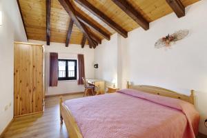 Postel nebo postele na pokoji v ubytování Casa Predaia