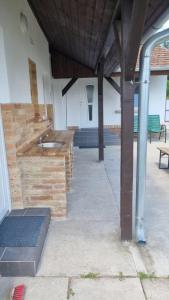A patio or other outdoor area at ALFA Szálláshely