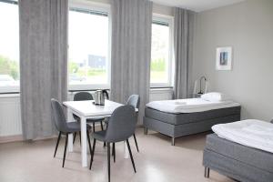 Postel nebo postele na pokoji v ubytování Sidsjö Hotell & Konferens