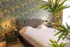 Postel nebo postele na pokoji v ubytování M Hotel + 37 fotografií