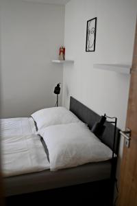 Postel nebo postele na pokoji v ubytování Apartmány Bolevec Plzeň pro rodiny s dětmi a zvířátky