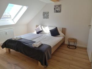Postel nebo postele na pokoji v ubytování A&F Hotel Chemnitz