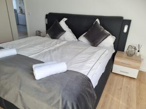 Postel nebo postele na pokoji v ubytování A&F Hotel Chemnitz