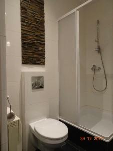 Et badeværelse på Cybulskiego Guest Rooms