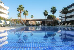 Basen w obiekcie Luxurious apartment in Flamenca Village with pool view VDE-095 lub w pobliżu