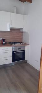Kuchyňa alebo kuchynka v ubytovaní Paradise, Porto Saler ET7104