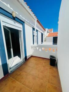 a view of the balcony of a house at Só Mar in Vila Nova de Milfontes