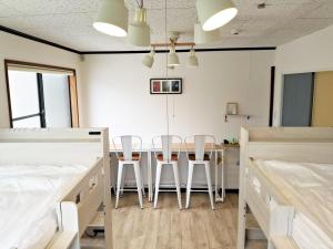 Guest House Tatara客房内的一张或多张床位