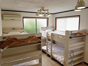 Postel nebo postele na pokoji v ubytování Guest House Tatara