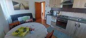 Кухня або міні-кухня у Apartment San