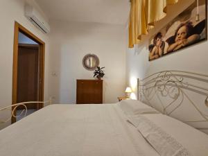 Una cama o camas en una habitación de Residenza Albachiara - Salento Casa al Mare