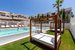 a view of the pool at the villas at embassy reef at Jardiana Lotus - Walking distance to La Cala De Mijas in La Cala de Mijas
