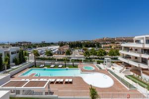 an aerial view of a swimming pool in a building at Jardiana Lotus - Walking distance to La Cala De Mijas in La Cala de Mijas