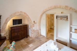 A television and/or entertainment centre at Trulli Audendum