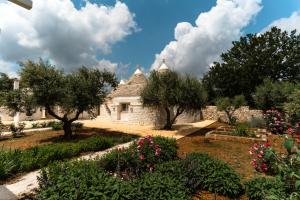 Zahrada ubytování Trulli Audendum