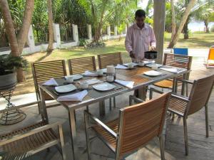 A restaurant or other place to eat at Isana Beach House