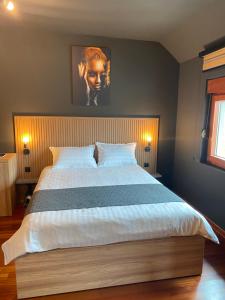 מיטה או מיטות בחדר ב-Forma Mountain Lux Apartments