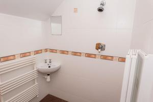 Koupelna v ubytování Kilkee Townhouse by Trident Holiday Homes