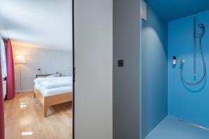 Linde Heiden Swiss Quality Hotel客房内的一张或多张床位