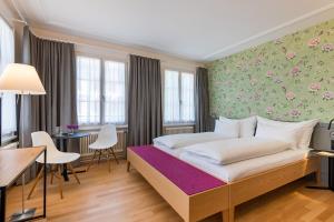 Linde Heiden Swiss Quality Hotel客房内的一张或多张床位