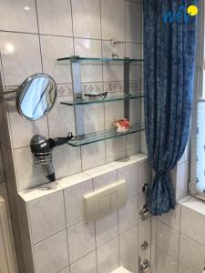 Koupelna v ubytování Haus Strandburg Ferienwohnung "Möwenblick" + 16 fotografií