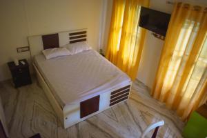 Vrindavan homestay客房内的一张或多张床位