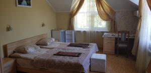 En eller flere senge i et værelse på VILLA VERA