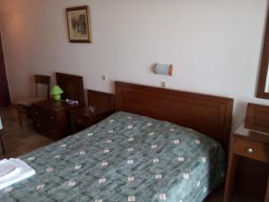 Postel nebo postele na pokoji v ubytování Akrogiali