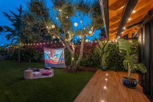 Ein Garten an der Unterkunft BARCELONA´S TROPICAL OASIS
