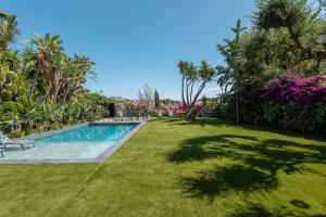 Der Swimmingpool an oder in der Nähe von BARCELONA´S TROPICAL OASIS