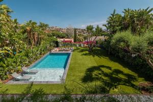 Der Swimmingpool an oder in der Nähe von BARCELONA´S TROPICAL OASIS