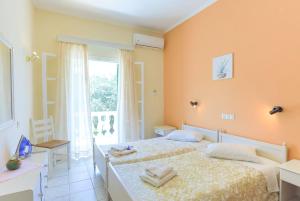 Postel nebo postele na pokoji v ubytování Fran Apartments