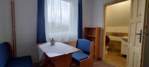Coin salon dans l'établissement Apartmány u Bernardů