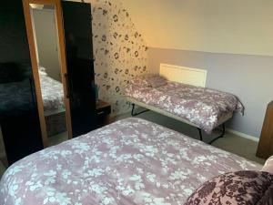 Letto o letti in una camera di Strawberry Fields - CENTRAL TORQUAY