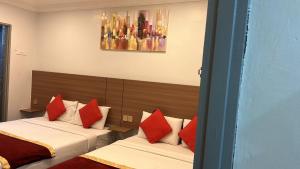 Postel nebo postele na pokoji v ubytování ESM Hotel