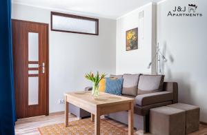Posedenie v ubytovaní J&J Apartments, Szeroka 25, Apartament 14