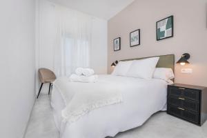 Postel nebo postele na pokoji v ubytování Exclusivo Dúplex Carrera