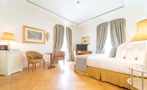 Кровать или кровати в номере Relais Villa San Martino