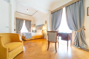 Кровать или кровати в номере Relais Villa San Martino