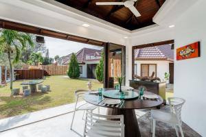 Zahrada ubytování Bamboo Rimbun-Tranquil Seaside Villa, Port Dickson
