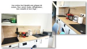 uma cozinha com armários brancos e um balcão com um lavatório em Le belle vue – tout confort em Saint-Brieuc
