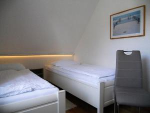 Voodi või voodid majutusasutuse Rugstieg 8 Whg 4 toas