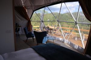 Χώρος καθιστικού στο Bulle de l'Escale Coconing avec jacuzzi privatif