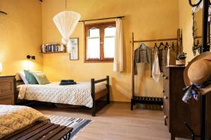 Postel nebo postele na pokoji v ubytování Villa Pigadi Nikiti beach vacation